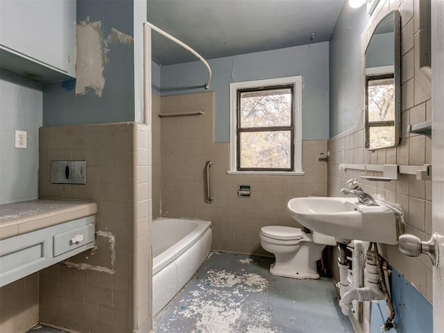 full bathroom featuring shower / tub combination, toilet, tile walls, and sink