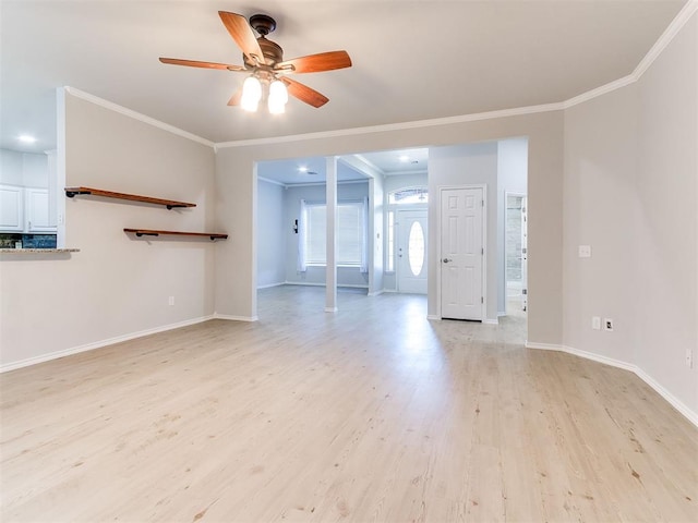 unfurnished living room featuring light hardwood / wood-style floors, ceiling fan, and ornamental molding