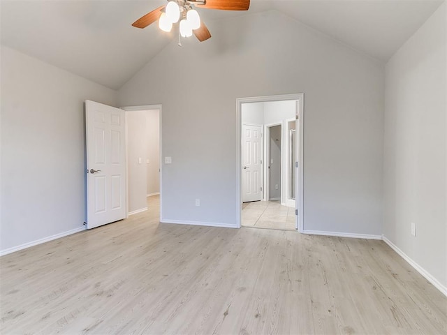 unfurnished bedroom with high vaulted ceiling, light hardwood / wood-style flooring, and ceiling fan