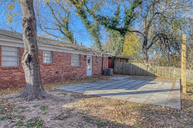 back of house with a patio and cooling unit