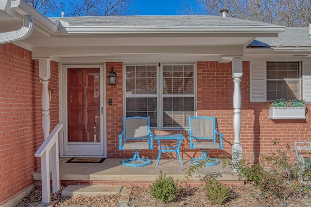 doorway to property with a porch