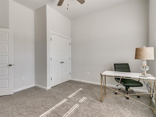 home office with carpet flooring and ceiling fan