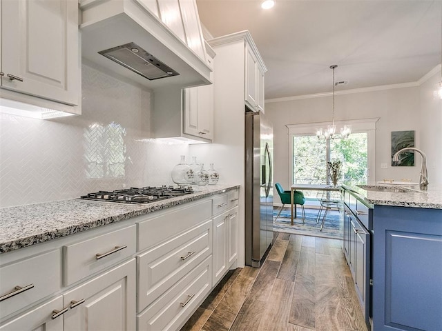 kitchen featuring white cabinets, dark hardwood / wood-style floors, appliances with stainless steel finishes, and custom exhaust hood