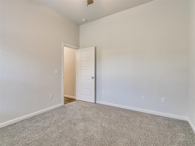 empty room with carpet flooring