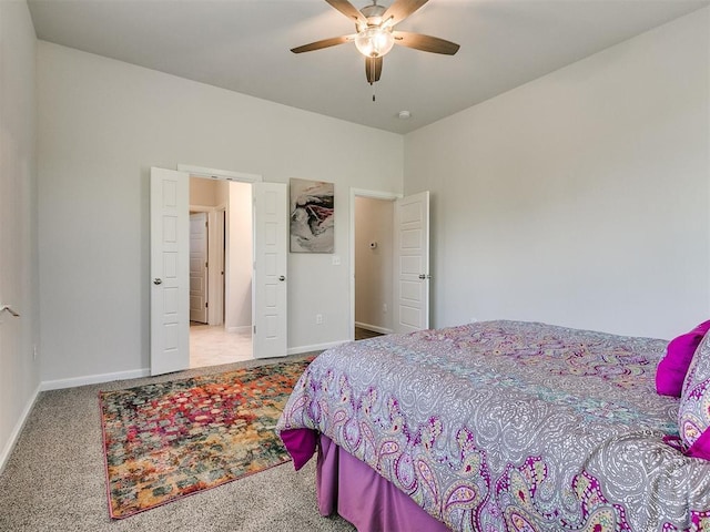 bedroom with light carpet and ceiling fan