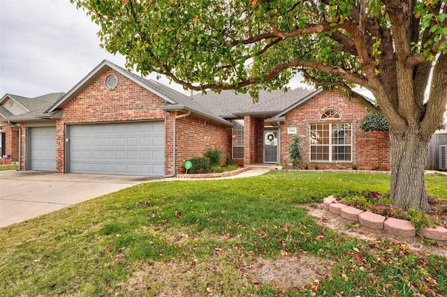 single story home with a garage and a front lawn