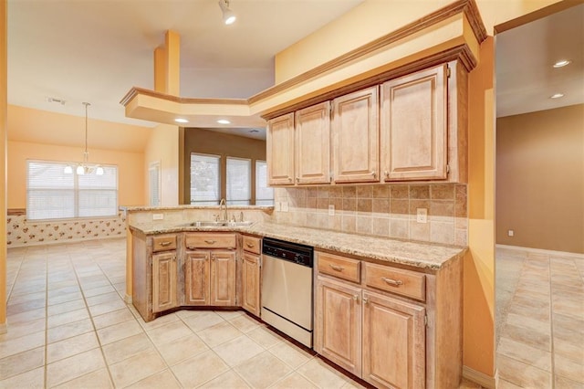 kitchen featuring light brown cabinetry, stainless steel dishwasher, sink, an inviting chandelier, and light tile patterned flooring