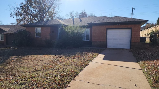 single story home with a garage