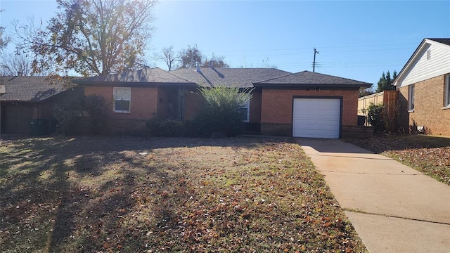 ranch-style house featuring a garage