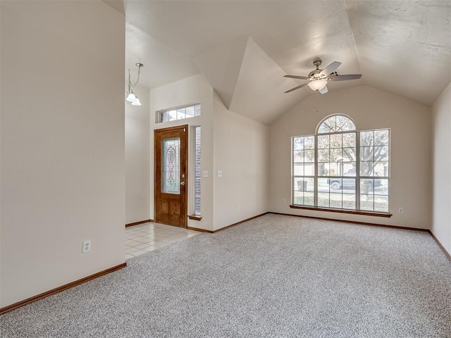 1036 SW 129th St, Moore, OK 73170 - entrance foyer with plenty of natural light, carpet, ceiling fan, and vaulted ceiling