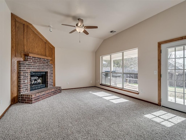 1036 SW 129th St, Moore, OK 73170 - unfurnished living room with lofted ceiling, plenty of natural light, a ceiling fan, and carpet floors