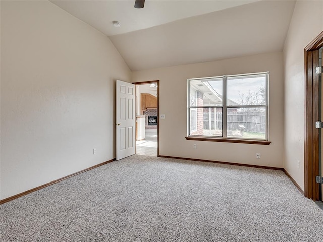 1036 SW 129th St, Moore, OK 73170 - unfurnished bedroom featuring light colored carpet, lofted ceiling, and ceiling fan