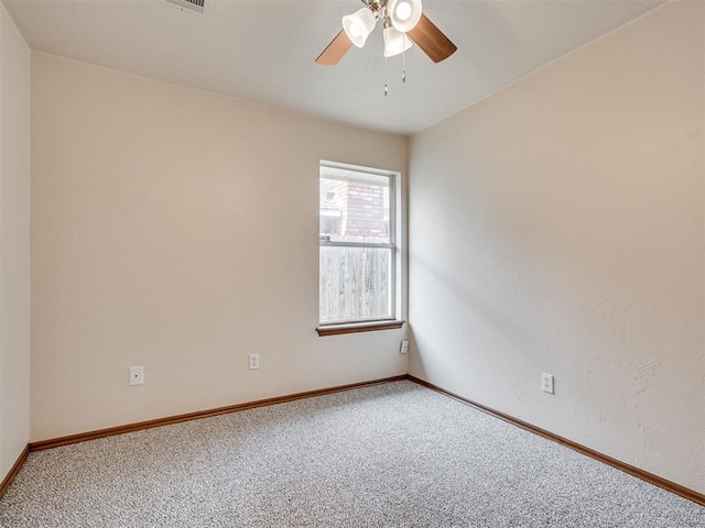 1036 SW 129th St, Moore, OK 73170 - carpeted empty room with a ceiling fan and baseboards
