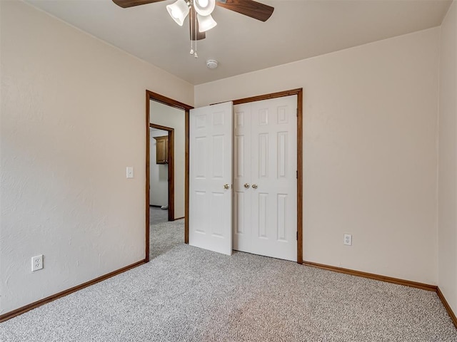 1036 SW 129th St, Moore, OK 73170 - unfurnished bedroom featuring carpet floors, a closet, and ceiling fan
