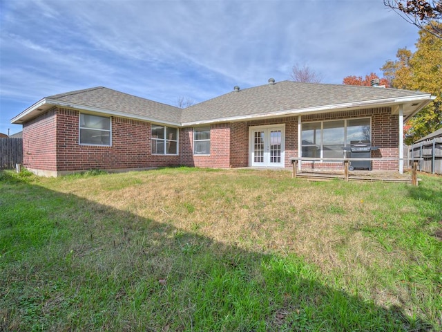 1036 SW 129th St, Moore, OK 73170 - back of house featuring french doors, brick siding, and roof with shingles