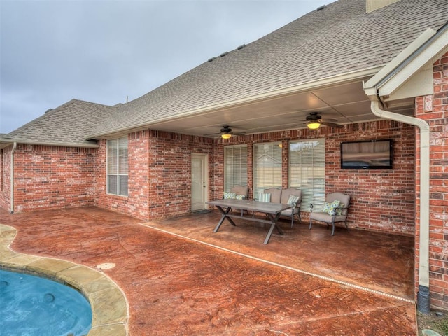 view of patio featuring ceiling fan