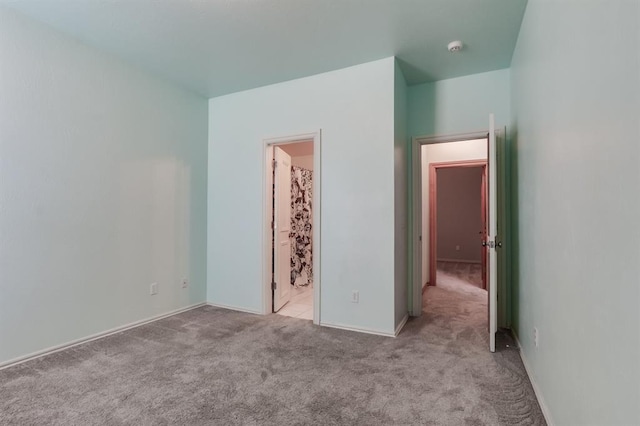 unfurnished bedroom featuring carpet floors