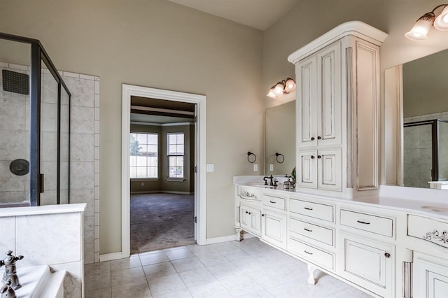 full bath with a bathing tub, a sink, a shower stall, tile patterned flooring, and double vanity