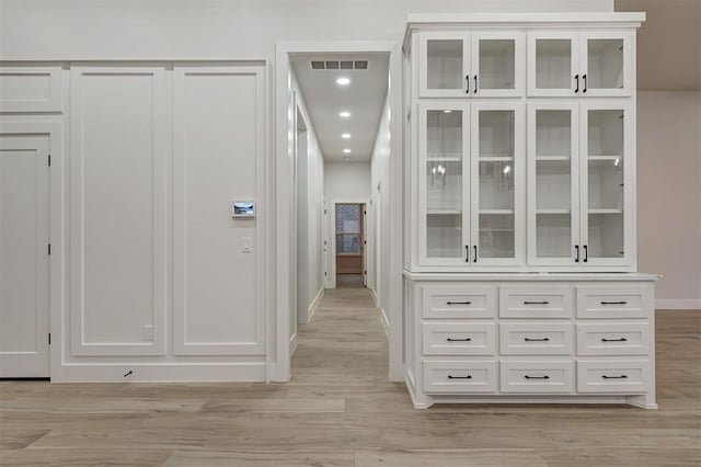 hallway featuring light wood-type flooring