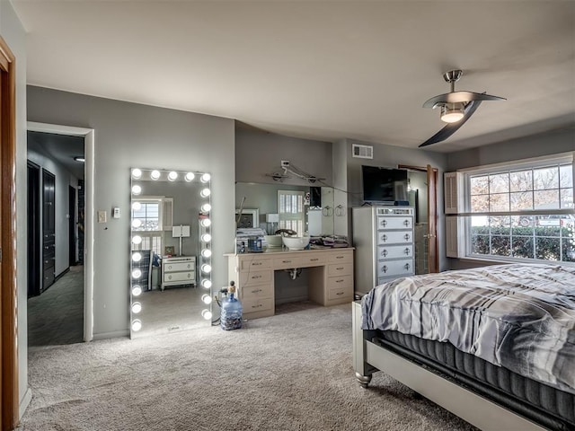 bedroom featuring ceiling fan and carpet floors