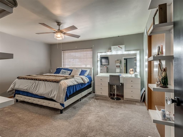 bedroom featuring light carpet and ceiling fan