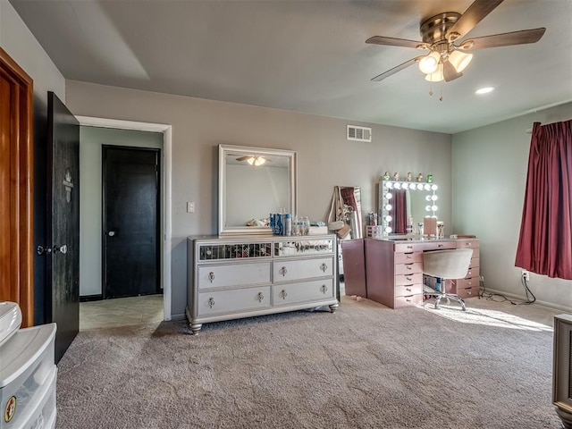 carpeted bedroom with ceiling fan