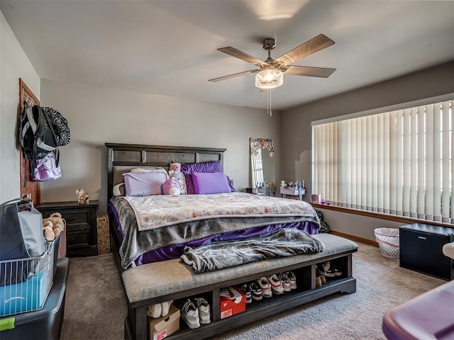 bedroom with ceiling fan and carpet