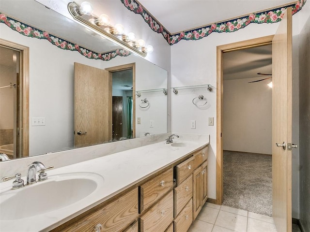 bathroom featuring tile patterned floors, ceiling fan, and vanity