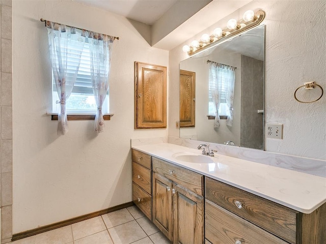 bathroom with vanity and tile patterned floors