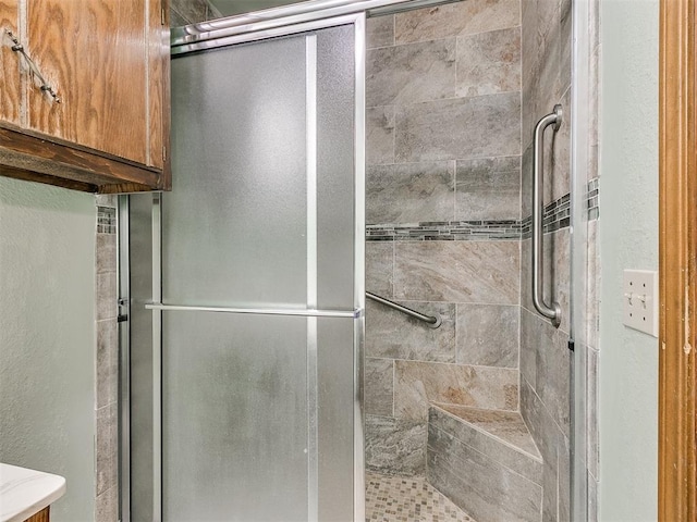 bathroom featuring an enclosed shower