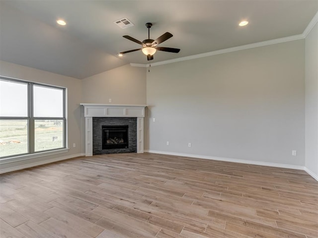 unfurnished living room with a tile fireplace, light hardwood / wood-style flooring, ceiling fan, and lofted ceiling