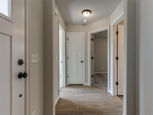 hall featuring light hardwood / wood-style floors