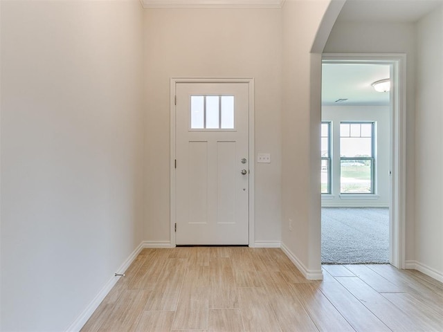 entryway with light hardwood / wood-style floors