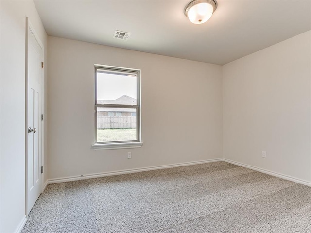 empty room featuring carpet flooring