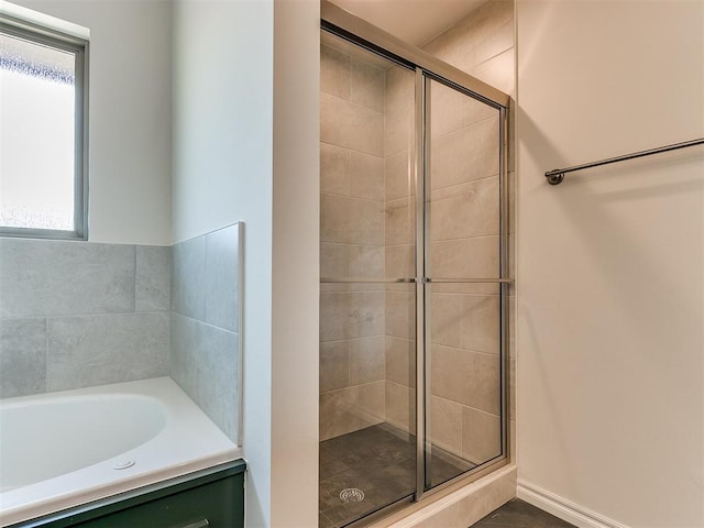 bathroom with independent shower and bath