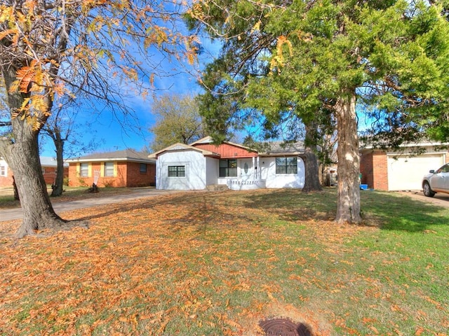 ranch-style house with a front lawn