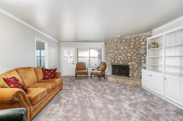 living room featuring a stone fireplace, crown molding, plenty of natural light, and light carpet