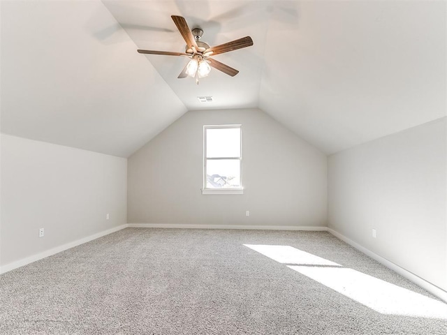 bonus room with carpet flooring, ceiling fan, and lofted ceiling