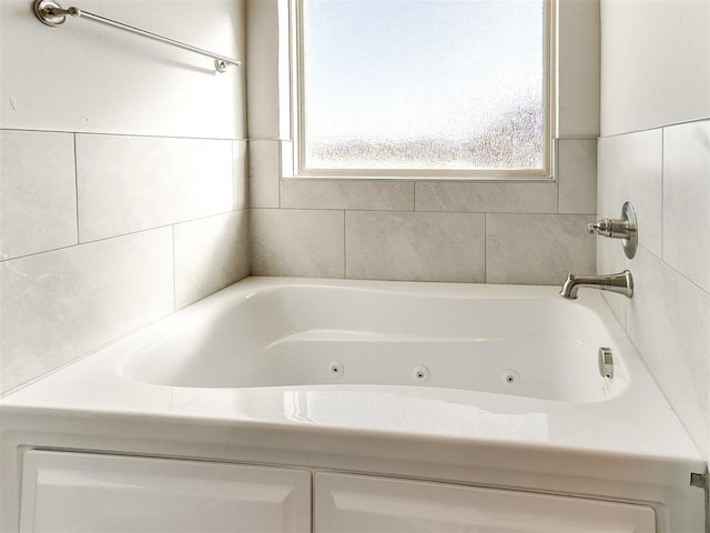 bathroom featuring a tub