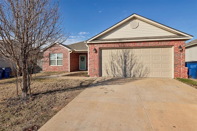 single story home with a garage, concrete driveway, and brick siding