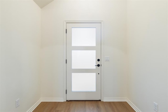 doorway to outside with light wood-type flooring