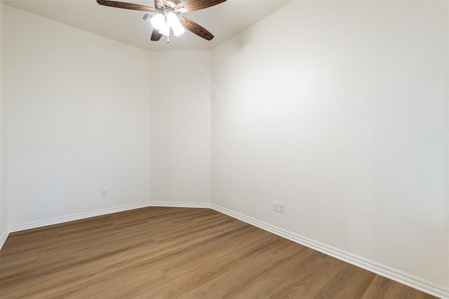 spare room with ceiling fan and light hardwood / wood-style floors