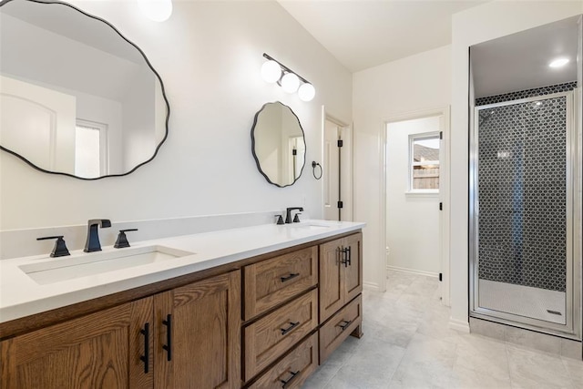 bathroom with vanity and walk in shower