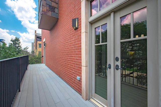 wooden terrace featuring french doors