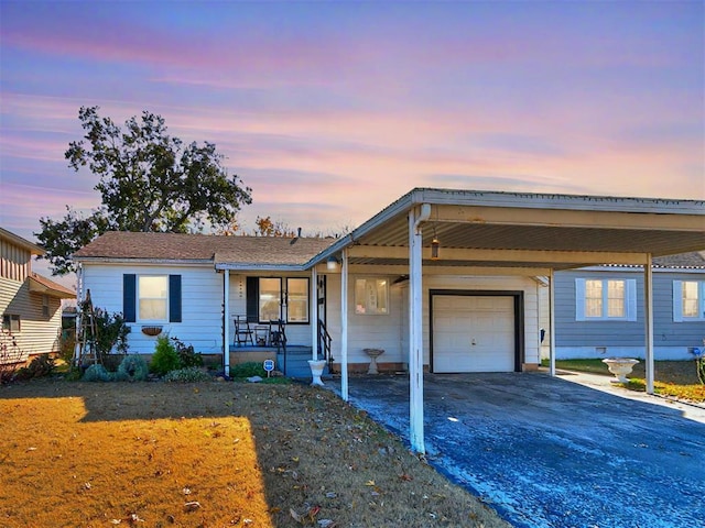 ranch-style home featuring a porch and a garage