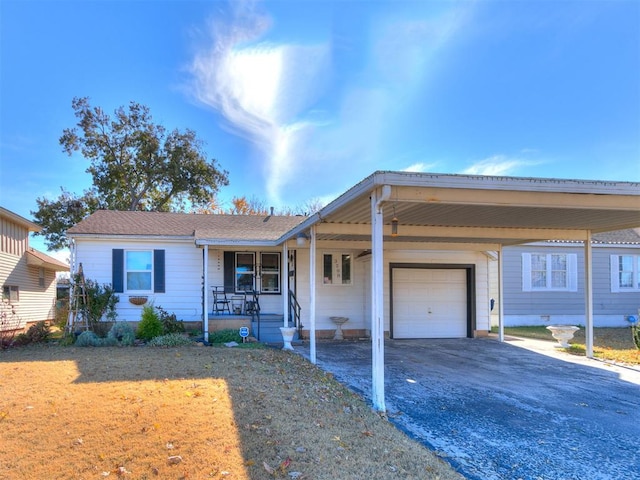 ranch-style home featuring a porch and a garage