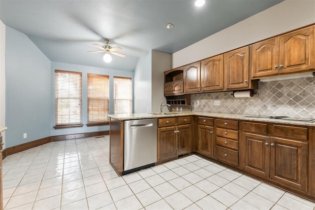 kitchen featuring light stone countertops, black electric cooktop, ceiling fan, light tile patterned floors, and dishwasher