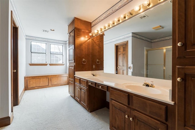 bathroom with vanity, separate shower and tub, and crown molding