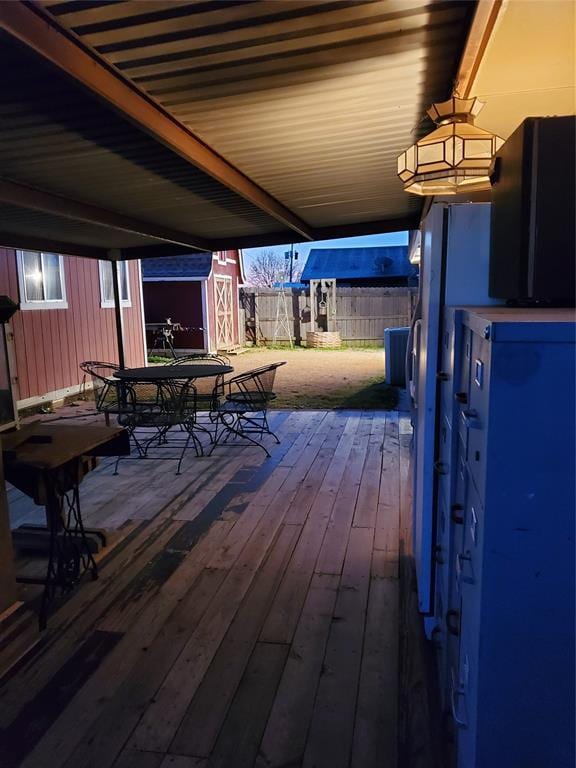 deck featuring a storage shed