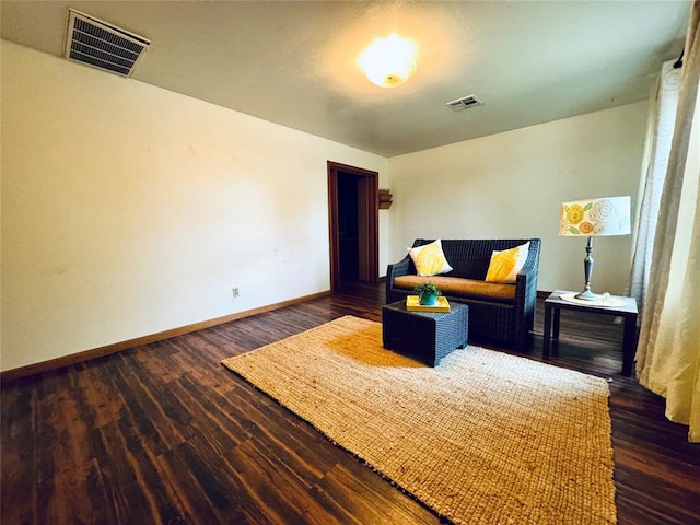 living room featuring dark wood-type flooring